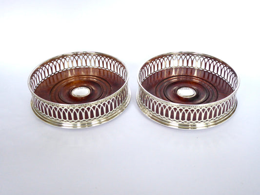 Pair of pierced Silver Coasters