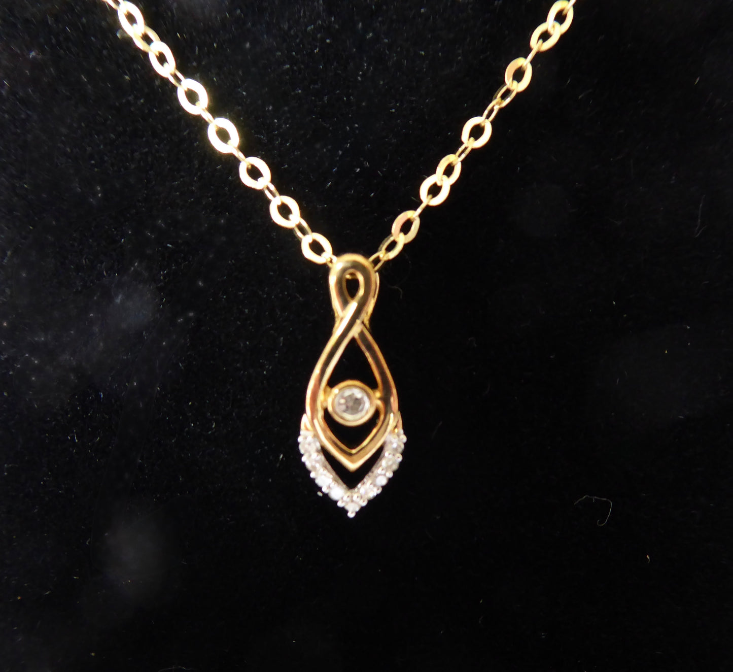 9ct. Gold Diamond Pendant