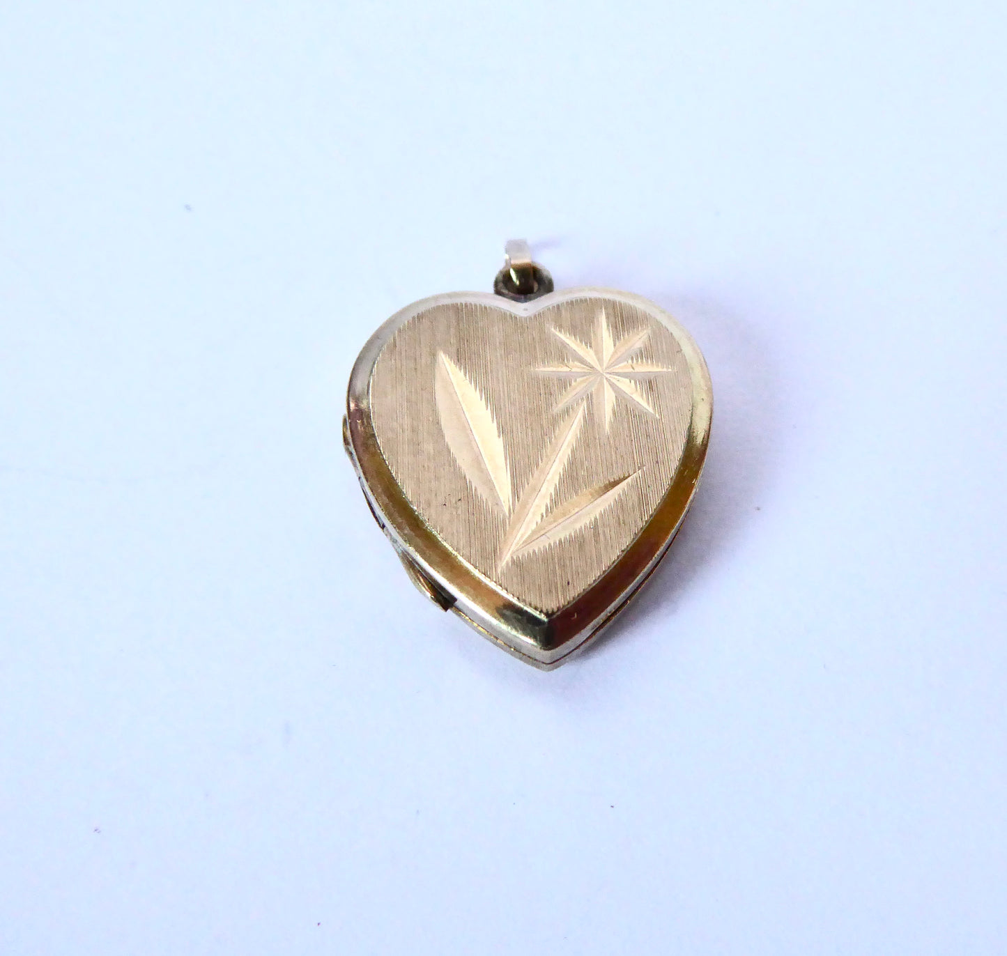 Flower Engraved Heart Locket 9ct.
