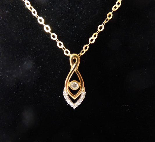 9ct. Gold Diamond Pendant