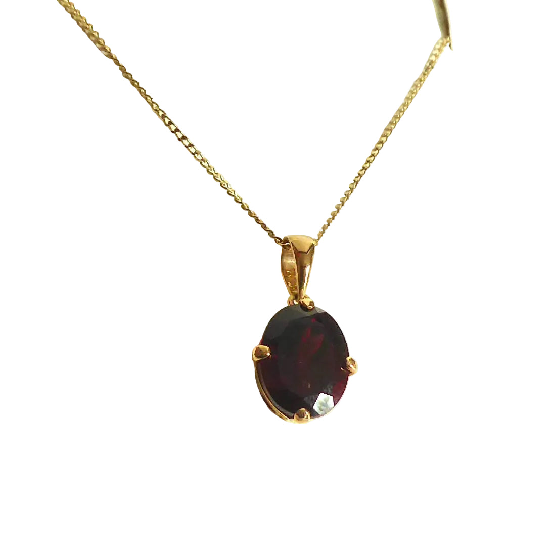 9ct. Vintage 9ct. Gold and garnet Pendant on a 9ct. Gold chainCirca 1970arnet Pendant